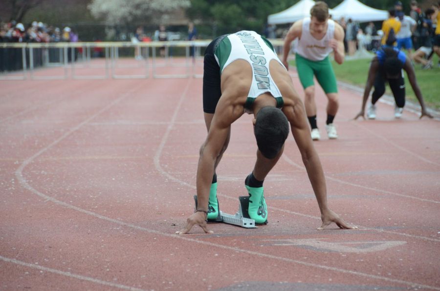 Track-and-field+athlete+Manny+Diaz+warms+up+for+the+400-hurdles+and+finishes+in+2nd+place.