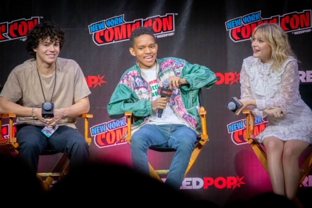 Outstanding teen actors Zackary Arthur (left), Björgivn Arnarson (middle), and actress Alyvia Alyn Lind (right) talk about Chucky Season 2 at the New York Comic Con. Photo Credit: Photo via public domain pictures under creative commons license