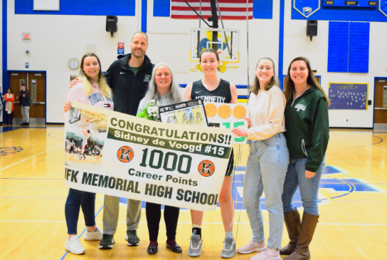 Sidney DeVoogd with family after scoring 1,000 points.