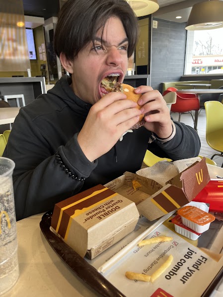 Justin loves his burgers!