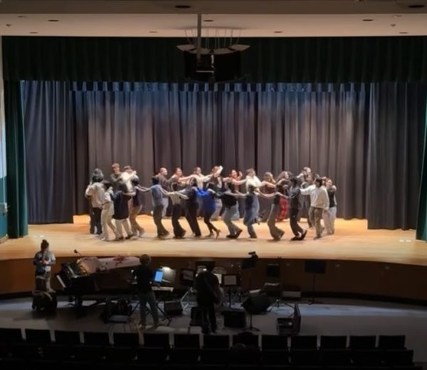 "Mamma Mia!" cast dancing to celebrate the end of rehearsal.