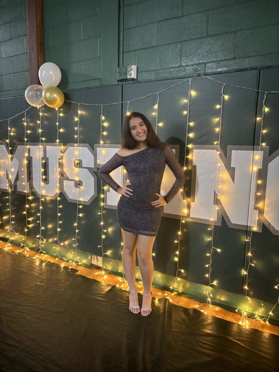 Senior Maansi Amin is dressed up to dance the night away at JFK's 2025 homecoming dance