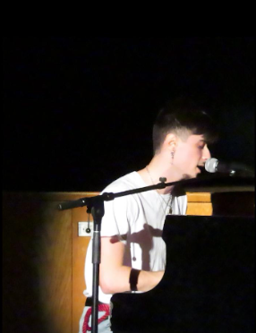 Nicholas Hein singing and playing the
piano to Tyler, The Creator’s “See You Again” during the Mr. JFK competition.